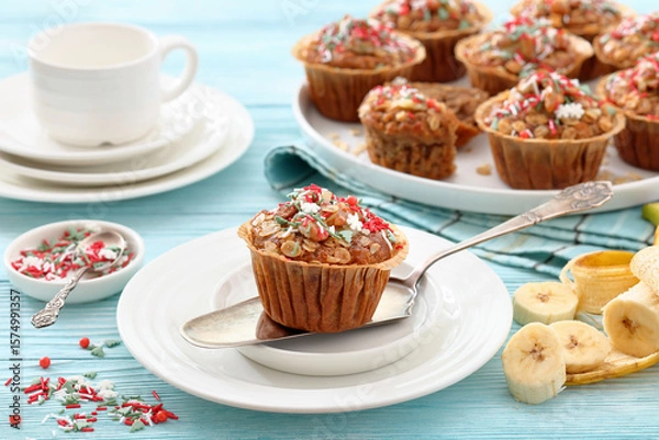 Fototapeta banana bread oat muffins with christmas sprinkles
