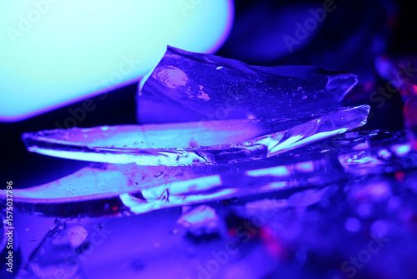 Fototapeta Colorful Abstract Background of Shattered Glass with Vibrant Lighting