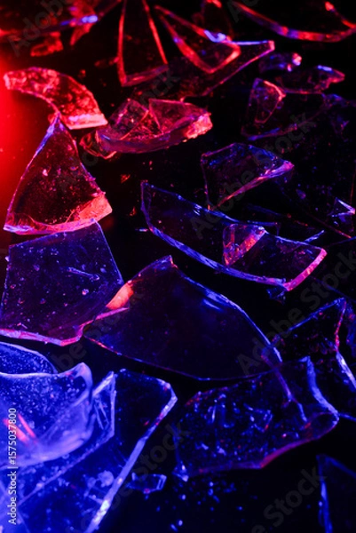 Fototapeta Colorful Abstract Background of Shattered Glass with Vibrant Lighting