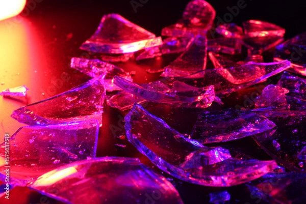 Fototapeta Colorful Abstract Background of Shattered Glass with Vibrant Lighting