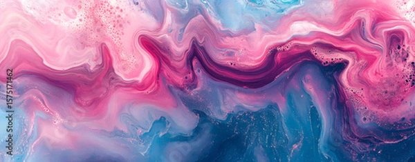 Fototapeta An abstract watercolor background with soft blue and pink paint splashes creates a fluid, artistic texture perfect for modern design