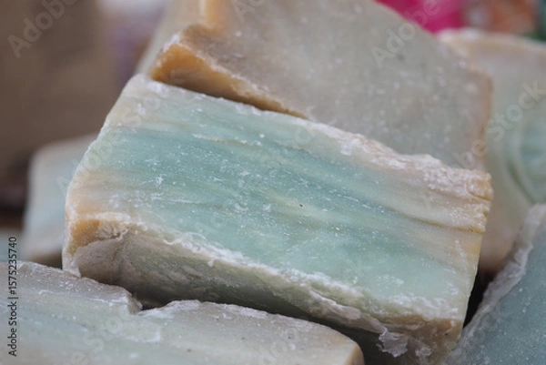 Fototapeta Natural soap bars in soft blue and cream colors on display