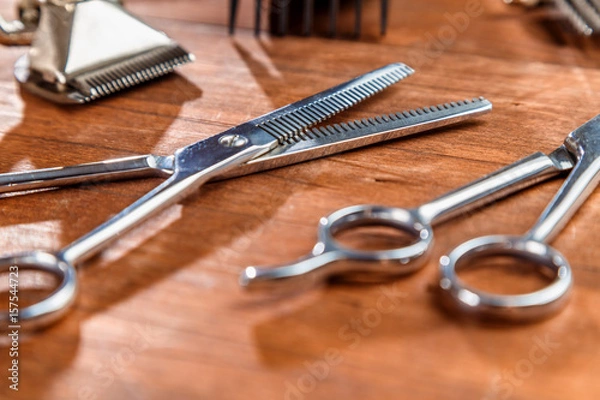Fototapeta scissors and tools for dog grooming on the table