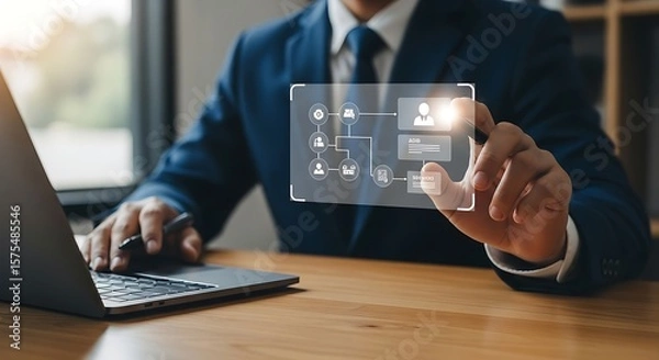 Fototapeta Modern businessman interacts with a digital interface navigating data streams with precision on a glowing screen blue