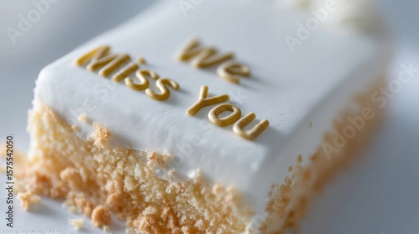Obraz Farewell message on employee cake with white frosting and golden letters expressing we miss you in soft and heartfelt way