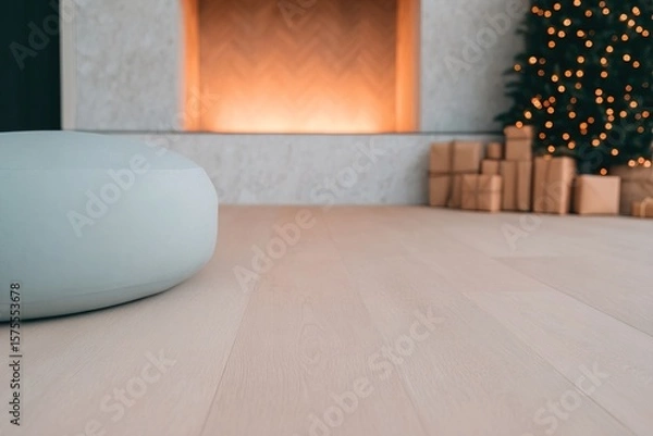 Obraz Cozy winter evening by the fireplace with sparkling tree lights and gifts