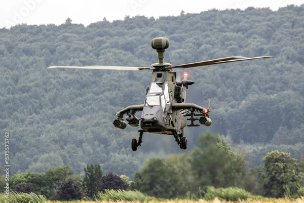 Obraz German Army armed attack helicopter hovering in mid-air during flight operation