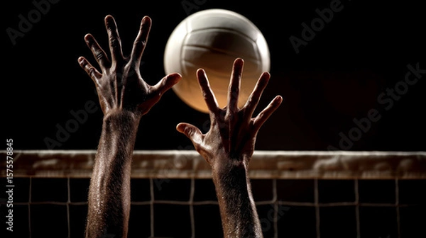 Fototapeta Dynamic close up of hands blocking volleyball spike at net, with dramatic lighting and motion blur
