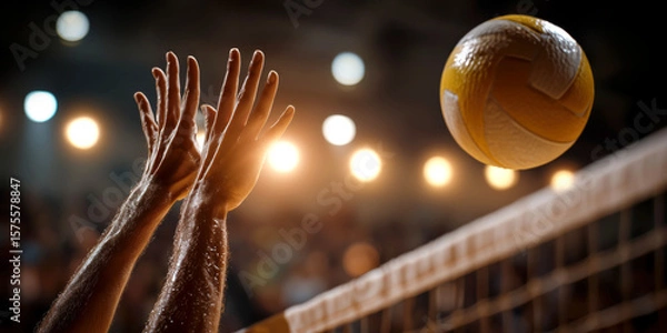 Fototapeta Dynamic close up of hands blocking volleyball spike at net, with dramatic lighting and motion blur