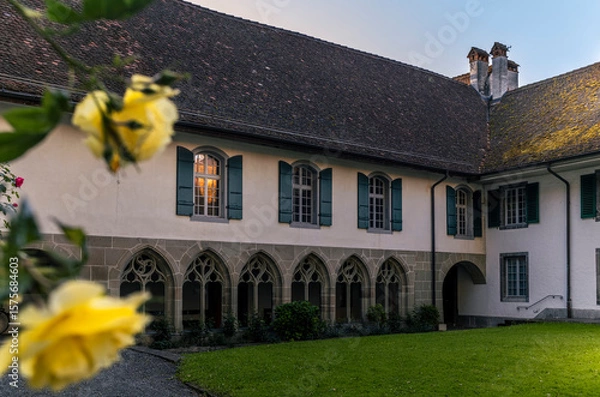 Fototapeta The Interlaken castle in Switzerland at sunrise in a warm day of May