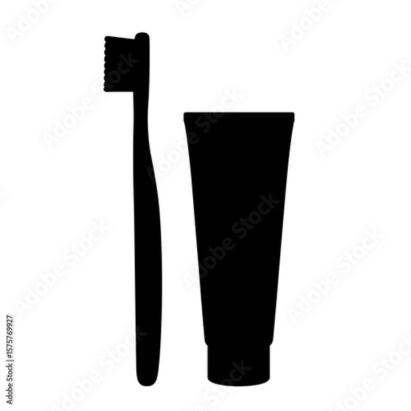 Fototapeta Bamboo toothbrush and toothpaste silhouette, eco-friendly oral care