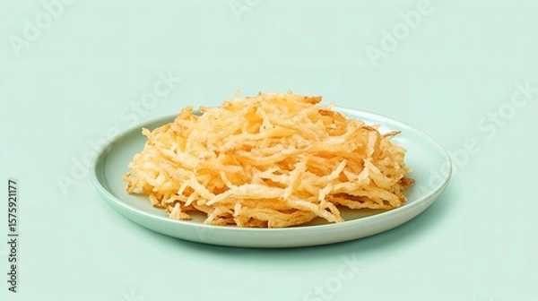 Obraz A plate of crisp shredded hash browns with frank potato strands over pale green setting depict fit and savory meal delish food, Generative AI.