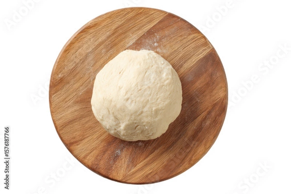 Fototapeta Dough on Wooden Board: A fresh ball of dough rests on a rustic wooden board, ready for shaping and baking, symbolizing the art of home-cooked meals and culinary delight.