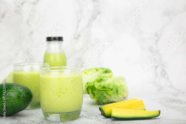 Fototapeta fresh avocado smoothie paired with green cos salad, served in a clean healthy beverage refreshing and nutritious plant based drink with care and balance.