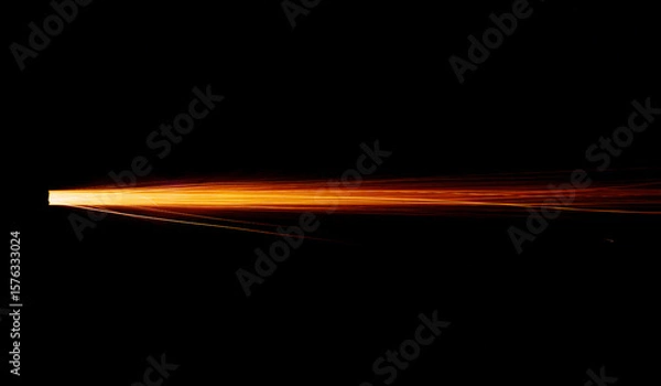 Fototapeta A shot from a firearm on a black background