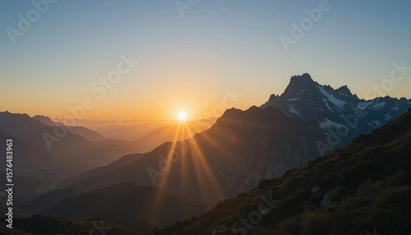Fototapeta Golden Sunset Over a Mountain Range