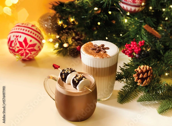 Fototapeta Cozy Hot Chocolate with Rocky Road Marshmallows and Festive Ginger Latte Macchiato with Chocolate Snowflake topped with rich frothy milk served in glass mug assorted hot beverage