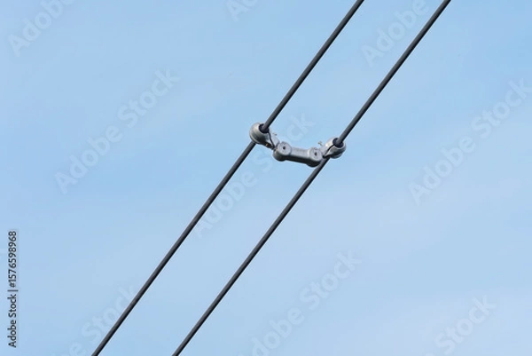Obraz Power Line Spacer or spacer damper used in bundled conductor systems on high-voltage power lines