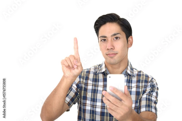 Obraz スマートフォンを持つ男性