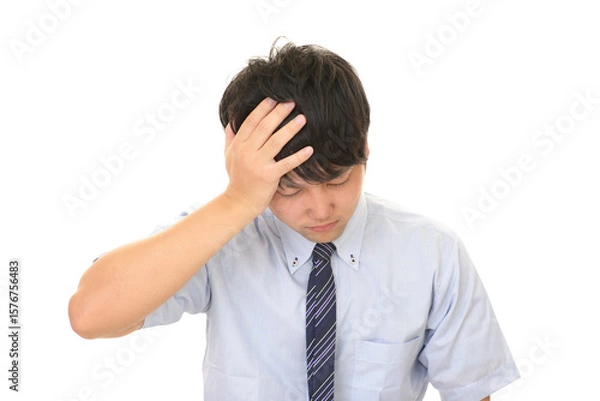 Obraz 落ち込む男性