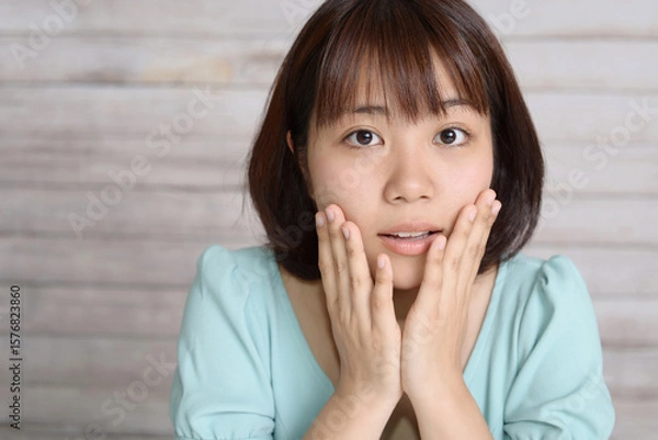 Obraz 困った表情の女性