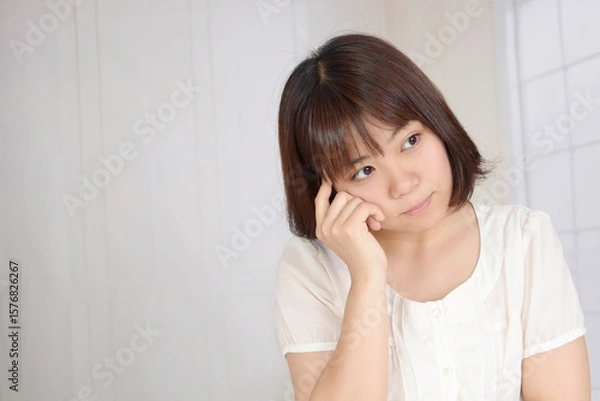 Obraz 困った表情の女性