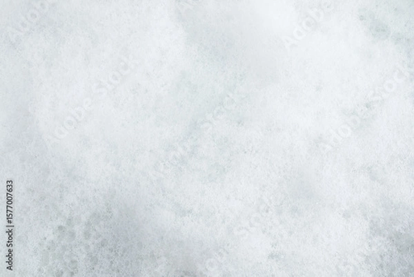 Obraz The texture of the white white surface of the detergent, spa cosmetic product. the background is white fluffy foam. Layout for design, copy of space.
