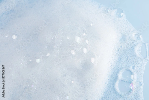 Obraz large transparent bubbles on the foam surface of detergent or cosmetics. white foam surface. texture.