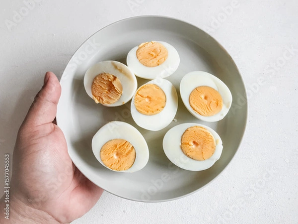 Obraz Top View of Boiled Egg on White Plate