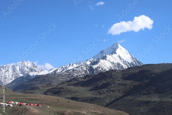 Obraz mountain landscape with snow and clouds