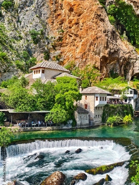 Fototapeta Dervish house in Blagaj with Cascading Waterfall