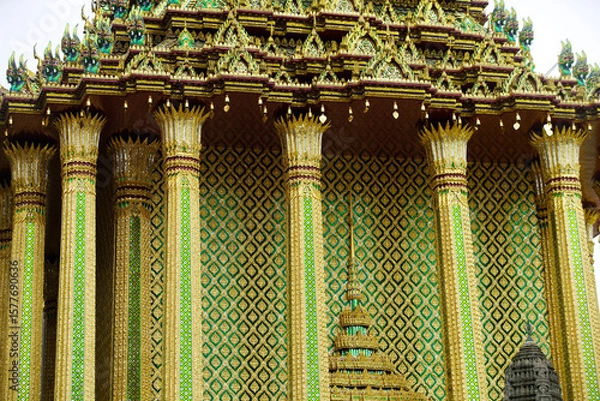 Fototapeta Intricate Architectural Detail of a Golden Temple in Thailand