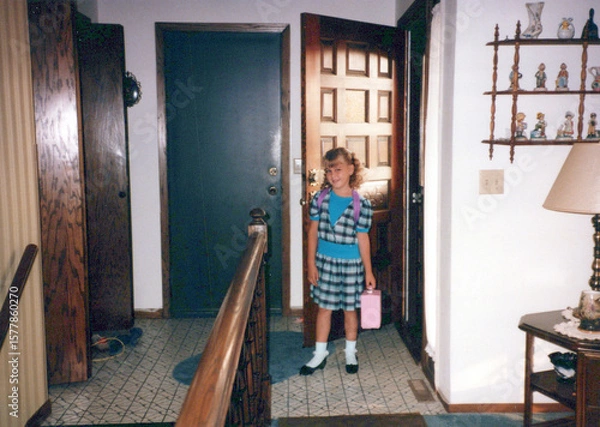 Fototapeta Circa 1986 - back to school first day portrait of a first grader student going to elementary school