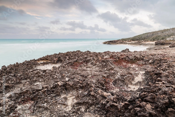 Fototapeta Sunset on the sandy beach of the Atlantic Ocean.