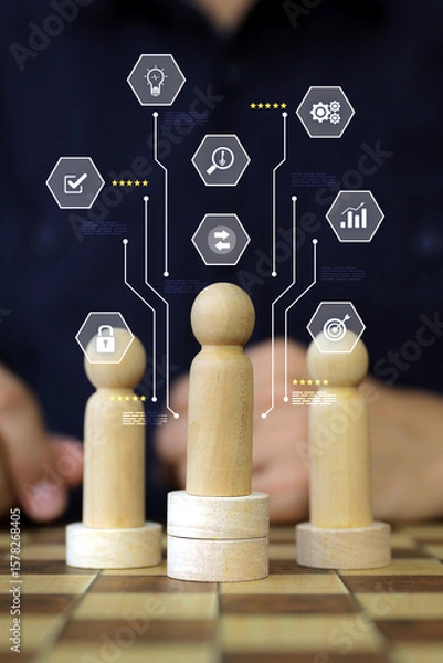 Fototapeta Hand chooses person wooden doll with HR human resources icons for leader of group teamwork officer or business planning relationship or team player and personnel management job performance.