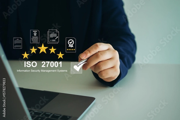 Fototapeta ISO 27001 concept. Businesswoman with ISO 27001 certified for information security management system (ISMS). requirements, certification, management, standards