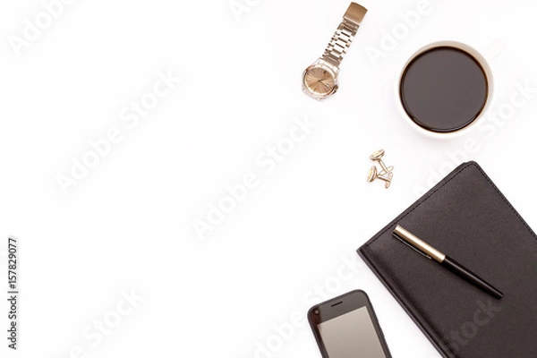 Obraz Black diary, pen, phone, watch and a Cup of black coffee on a white background. Minimal business concept for men.