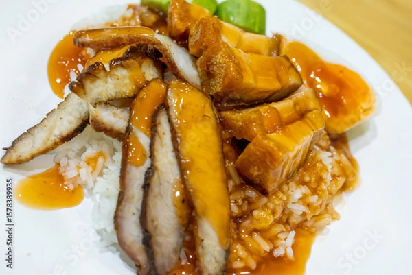 Fototapeta Top view of Red pork and crispy pork rice, focus selective