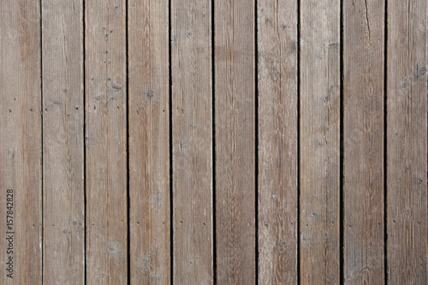 Fototapeta New planks in light grey tone with dark streaks coming from nails