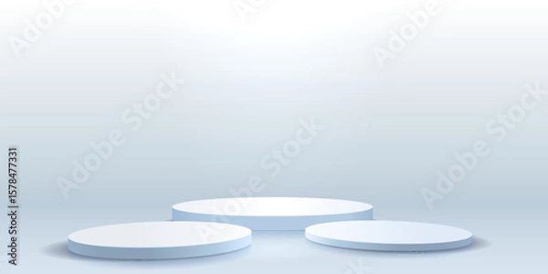 Fototapeta Three 3D cylindrical podiums with studio lighting.