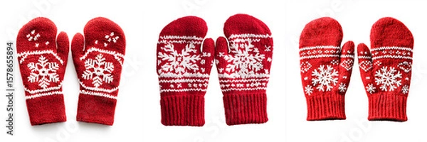 Obraz red mittens with white snowflake patterns