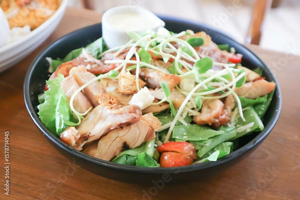 Fototapeta pork salad or grilled pork salad or caesar salad or vegetable salad with pork