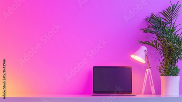 Fototapeta Modern workspace featuring laptop, stylish desk lamp, and potted plant against vibrant purple wall, creating calming atmosphere