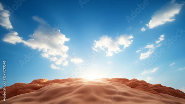 Obraz Bright sun rises over sandy dunes under clear blue sky, creating serene landscape