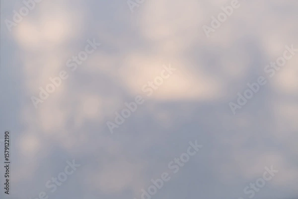 Fototapeta Blurred shadows from foliage on a white wall.