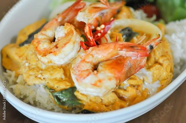 Fototapeta creamy omelet or omelet or omelette or fried egg with shrimp and squid or seafood omelette and rice