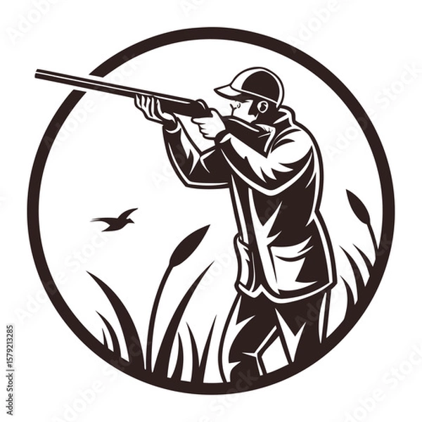 Fototapeta Hunter aims his shotgun towards a flying bird within a circular monochromatic frame