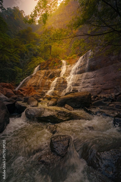Fototapeta waterfall in the mountains at Curug Cikanteh Ciletuh National Geopark Sukabumi West Java Indonesia