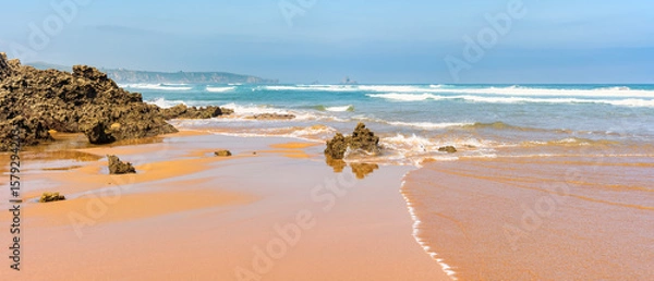 Fototapeta Panoramic view of the Costa Quebrada with huge waves and rock formations in the north of Spain, Cantabria.