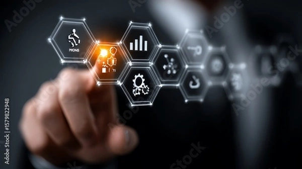 Fototapeta Person touching a futuristic digital interface with glowing hexagonal icons representing business concepts
